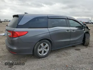2020 Honda Odyssey EX-L with VIN 5FNRL6H77LB053111, listed as a Copart auction lot 46974065 with 71,246 mi miles and Salvage Title. Bid and sale history available at carsss.com. Image 3.