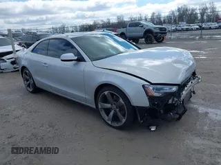 2014 Audi A5 Premium Plus with VIN WAULFAFR8EA031017, listed as a IAAI auction lot 41730204 with 130,402 mi miles and . Bid and sale history available at DreamBid. Image 1.