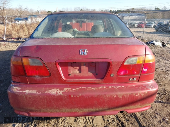 1999 Honda Civic LX with VIN 1HGEJ6579XL014663, listed as a IAAI auction lot 41250453 with 251,342 mi miles. Bid and sale history available at carsss.com. Image 6.