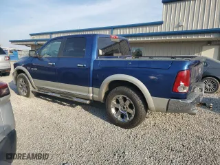 2009 Dodge Ram 1500 Laramie with VIN 1D3HB13T89J521779, listed as a Copart auction lot 48239135 with 144,414 mi miles and Salvage Title. Bid and sale history available at carsss.com. Image 2.