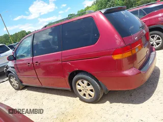 2003 Honda Odyssey EX with VIN 5FNRL18663B021888, listed as a IAAI auction lot 42343770 with 261,998 mi miles and . Bid and sale history available at DreamBid. Image 14.