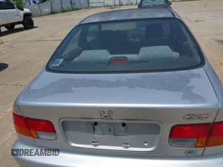 1997 Honda Civic EX z VIN 1HGEJ8146VL015936, wystawiony jako IAAI lot #42461577 z przebiegiem 267 563 mil mil oraz . Historia ofert i sprzedaży dostępna na DreamBid. Obrazek 14.