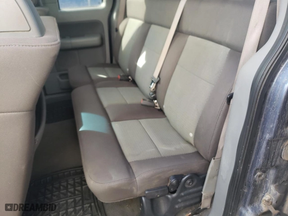 2005 Ford F-150 STX with VIN 1FTRX04W75KC31023, listed as a Copart auction lot 77093034 with 266,966 mi miles and Salvage Title. Bid and sale history available at carsss.com. Image 10.