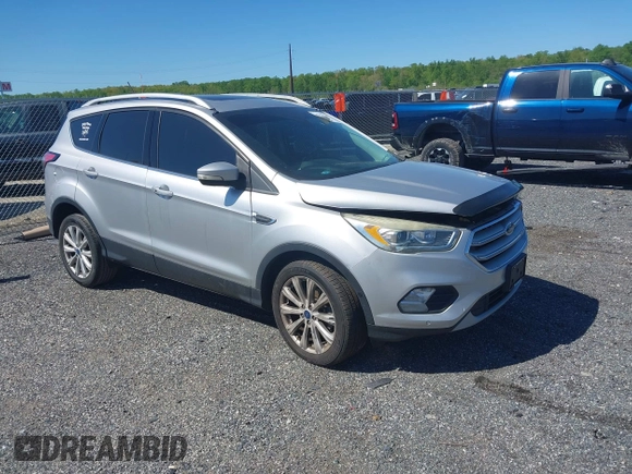 2018 Ford Escape Titanium with VIN 1FMCU9J96JUA33500, listed as a IAAI auction lot 42121736 with 105,430 mi miles and . Bid and sale history available at DreamBid. Image 1.