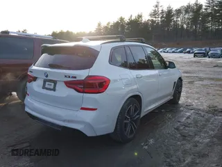 2020 BMW X3 M with VIN 5YMTS0C0XL9B25245, listed as a IAAI auction lot 41607826 with 52,456 mi miles. Bid and sale history available at carsss.com. Image 4.