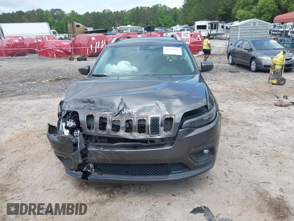 2019 Jeep Cherokee Latitude Plus with VIN 1C4PJLLBXKD305219, listed as a IAAI auction lot 42150283 with 89,000 mi miles and . Bid and sale history available at DreamBid. Image 12.