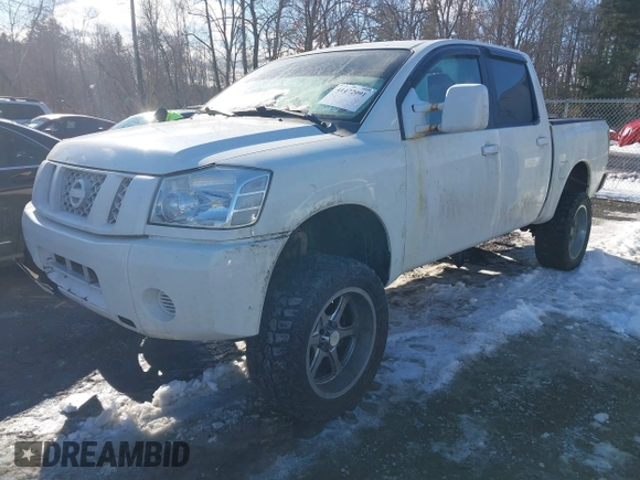 2012 Nissan Titan SV with VIN 1N6BA0EJ0CN309933, listed as a IAAI auction lot 41472091 with 147,635 mi miles. Bid and sale history available at carsss.com. Image 17.