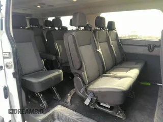 2023 Ford Transit Passenger XL with VIN 1FBAX2YG6PKA64348, listed as a IAAI auction lot 41850514 with 60,902 mi miles and . Bid and sale history available at DreamBid. Image 8.