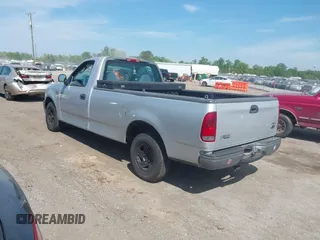 2002 Ford F-150 XL with VIN 1FTRF17202NB42616, listed as a IAAI auction lot 42117616 with 230,852 mi miles. Bid and sale history available at carsss.com. Image 3.