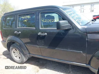 2009 Dodge Nitro SE z VIN 1D8GT28K69W505396, wystawiony jako IAAI lot #42104252 z przebiegiem 144 026 mil mil oraz . Historia ofert i sprzedaży dostępna na DreamBid. Obrazek 13.