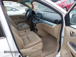 2010 Honda Odyssey Touring with VIN 5FNRL3H99AB005395, listed as a IAAI auction lot 42027445 with 181,559 mi miles. Bid and sale history available at carsss.com. Image 5.