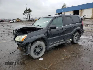 2004 Lexus GX 470 with VIN JTJBT20X140059411, listed as a Copart auction lot 52167715 with 211,520 mi miles and Clean Title. Bid and sale history available at carsss.com. Image 1.