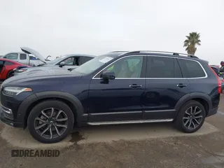 2016 Volvo XC90 T6 Momentum with VIN YV4A22PK8G1022234, listed as a IAAI auction lot 41705411 with 123,072 mi miles. Bid and sale history available at carsss.com. Image 14.