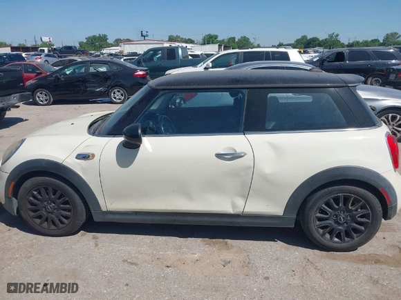 2015 MINI Cooper Hardtop S with VIN WMWXP7C50F2A34429, listed as a IAAI auction lot 41992816 with 160,316 mi miles. Bid and sale history available at carsss.com. Image 14.