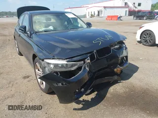 2014 BMW 3 Series 320i xDrive with VIN WBA3C3C56EK200175, listed as a IAAI auction lot 42617731 with 96,596 mi miles and . Bid and sale history available at DreamBid. Image 6.