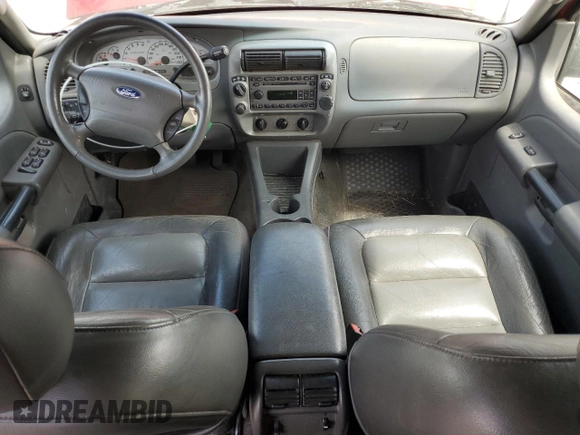 2004 Ford Explorer Sport Trac XLS with VIN 1FMDU77K74UC12586, listed as a Copart auction lot 61240815 with 96,377 mi miles and Salvage title. Bid and sale history available at DreamBid. Image 8.