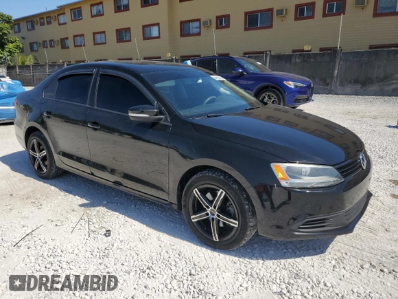 2012 Volkswagen Jetta SE with VIN 3VWDP7AJ4CM316531, listed as a Copart auction lot 54928305 with 164,199 mi miles and Salvage title. Bid and sale history available at DreamBid. Image 4.