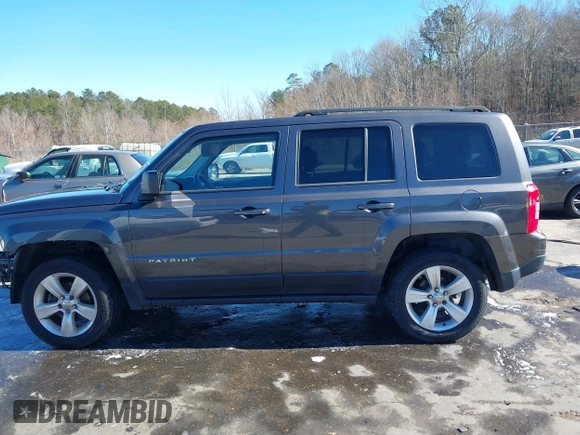 2014 Jeep Patriot Latitude with VIN 1C4NJRFB3ED886007, listed as a IAAI auction lot 41285963 with 127,007 mi miles and . Bid and sale history available at DreamBid. Image 15.