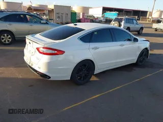 2014 Ford Fusion Titanium with VIN 3FA6P0K96ER234979, listed as a IAAI auction lot 41220106 with 98,068 mi miles. Bid and sale history available at carsss.com. Image 4.