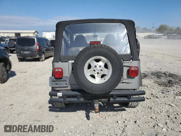 2000 Jeep Wrangler Sport with VIN 1J4FA49S4YP789348, listed as a Copart auction lot 50521365 with 0 mi miles and Salvage Title. Bid and sale history available at carsss.com. Image 6.