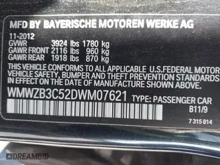 2013 MINI Cooper Countryman with VIN WMWZB3C52DWM07621, listed as a IAAI auction lot 42085389 with 153,714 mi miles. Bid and sale history available at carsss.com. Image 9.