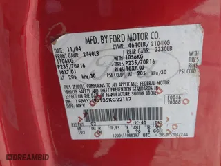 2005 Ford Escape Limited with VIN 1FMYU94135KC22117, listed as a IAAI auction lot 41441590 with 238,811 mi miles. Bid and sale history available at carsss.com. Image 9.