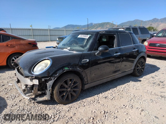 2015 MINI Hardtop 4 Door with VIN WMWXS5C51FT827202, listed as a Copart auction lot 59226065 with 130,647 mi miles and Salvage title. Bid and sale history available at DreamBid. Image 1.