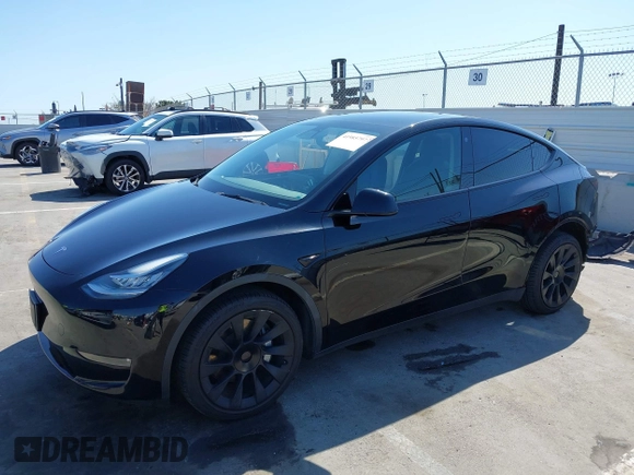 2022 Tesla Model Y Long Range with VIN 7SAYGDEE6NF480471, listed as a IAAI auction lot 41985797 with 82,777 mi miles and . Bid and sale history available at DreamBid. Image 21.