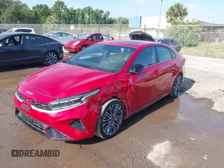 2023 Kia Forte GT with VIN 3KPF44ACXPE618328, listed as a IAAI auction lot 42137484 with 48,691 mi miles and . Bid and sale history available at carsss.com. Image 2.