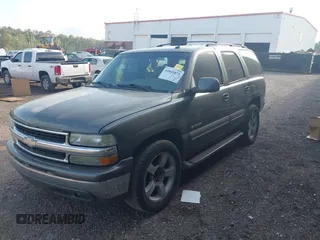 2002 Chevrolet Tahoe LT with VIN 1GNEC13Z92R273473, listed as a IAAI auction lot 41841071 with 290,007 mi miles. Bid and sale history available at carsss.com. Image 2.