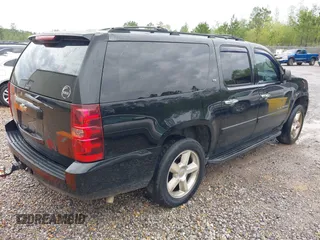 2007 Chevrolet Suburban LT with VIN 3GNFC16J87G228803, listed as a IAAI auction lot 41910240 with 303,191 mi miles and . Bid and sale history available at DreamBid. Image 4.