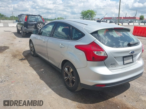 2014 Ford Focus SE with VIN 1FADP3K22EL140219, listed as a IAAI auction lot 42107380 with 205,519 mi miles. Bid and sale history available at carsss.com. Image 3.