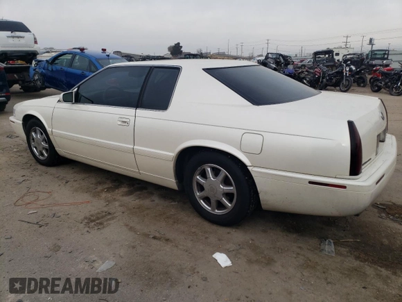 2001 Cadillac Eldorado Touring ETC z VIN 1G6ET12921B103685, wystawiony jako Copart lot #84565144 z przebiegiem 99 265 mil mil oraz Szkoda całkowita • Salvage title. Historia ofert i sprzedaży dostępna na DreamBid. Obrazek 2.