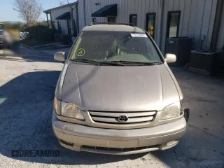 2001 Toyota Sienna LE with VIN 4T3ZF13C11U390198, listed as a Copart auction lot 76785094 with 200,803 mi miles and Salvage Title. Bid and sale history available at carsss.com. Image 5.