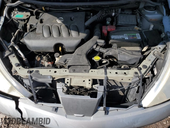 2007 Nissan Versa SL z VIN 3N1BC11E77L451507, wystawiony jako Copart lot #59663715 z przebiegiem 132 363 mil mil oraz Szkoda całkowita • Salvage title. Historia ofert i sprzedaży dostępna na DreamBid. Obrazek 11.