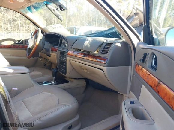 2002 Lincoln Continental with VIN 1LNHM97V12Y699605, listed as a IAAI auction lot 41235748 with 1 mi miles. Bid and sale history available at carsss.com. Image 5.