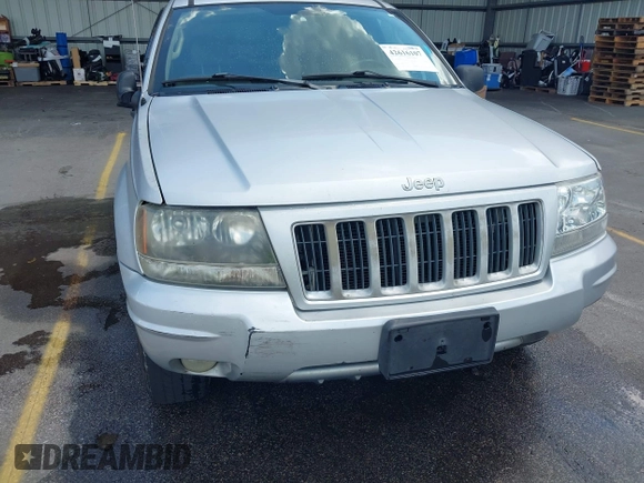 2004 Jeep Grand Cherokee Laredo with VIN 1J4GX48S34C258227, listed as a IAAI auction lot 42616107 with 160,424 mi miles and . Bid and sale history available at DreamBid. Image 6.