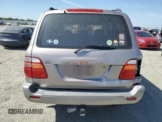 2001 Toyota Land Cruiser z VIN JTEHT05J812012460, wystawiony jako Copart lot #59053845 z przebiegiem 287 639 mil mil oraz Szkoda całkowita • Salvage title. Historia ofert i sprzedaży dostępna na DreamBid. Obrazek 6.