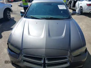 2013 Dodge Charger SE with VIN 2C3CDXBGXDH688230, listed as a IAAI auction lot 41634325 with 133,519 mi miles. Bid and sale history available at carsss.com. Image 12.