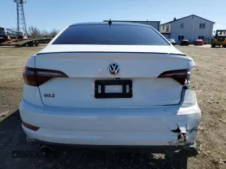 2019 Volkswagen Jetta GLI S with VIN 3VW5T7BU3KM161784, listed as a Copart auction lot 50157705 with 77,370 mi miles and Salvage Title. Bid and sale history available at DreamBid. Image 6.