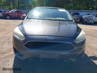 2015 Ford Focus SE with VIN 1FADP3F24FL219760, listed as a IAAI auction lot 41947221 with 163,259 mi miles. Bid and sale history available at carsss.com. Image 6.