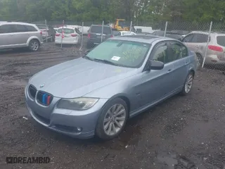 2011 BMW 3 Series 328i xDrive with VIN WBAPK5C59BA659489, listed as a IAAI auction lot 39439573 with 146,346 mi miles. Bid and sale history available at carsss.com. Image 2.