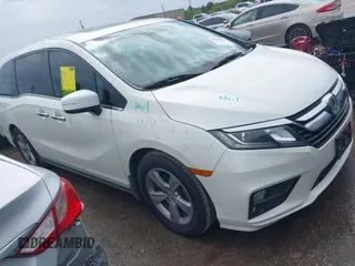 2019 Honda Odyssey EX-L z VIN 5FNRL6H73KB120964, wystawiony jako IAAI lot #41886871 z przebiegiem 77 409 mil mil oraz . Historia ofert i sprzedaży dostępna na DreamBid. Obrazek 1.