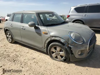 2019 MINI Hardtop 4 Door Cooper with VIN WMWXU1C57K2L09744, listed as a Copart auction lot 49324595 with 40,554 mi miles and Salvage Title. Bid and sale history available at carsss.com. Image 4.
