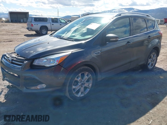 2016 Ford Escape Titanium with VIN 1FMCU9J96GUB96009, listed as a IAAI auction lot 41866127 with 132,990 mi miles and . Bid and sale history available at DreamBid. Image 18.
