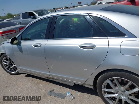 2015 Lincoln MKZ with VIN 3LN6L2J97FR608175, listed as a IAAI auction lot 41860094 with 196,965 mi miles and . Bid and sale history available at DreamBid. Image 14.