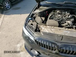 2020 BMW 3 Series 330i with VIN 3MW5R1J02L8B11737, listed as a Copart auction lot 70730975 with 67,046 mi miles and Salvage title. Bid and sale history available at DreamBid. Image 13.