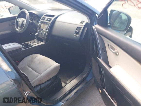 2015 Mazda CX-9 Sport with VIN JM3TB2BV7F0458193, listed as a IAAI auction lot 41886385 with 154,677 mi miles and . Bid and sale history available at carsss.com. Image 5.