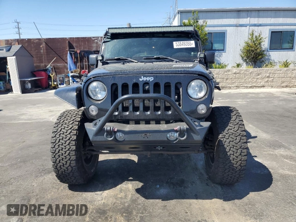 2014 Jeep Wrangler Unlimited Sahara z VIN 1C4BJWEG4EL164226, wystawiony jako Copart lot #53849355 z przebiegiem 82 145 mil mil oraz Szkoda całkowita • Salvage title. Historia ofert i sprzedaży dostępna na DreamBid. Obrazek 5.