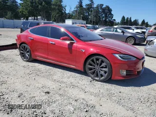 2017 Tesla Model S 100D with VIN 5YJSA1E24HF206828, listed as a Copart auction lot 66004605 with 94,874 mi miles and Salvage title. Bid and sale history available at DreamBid. Image 4.